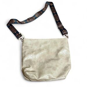 Versatile Cream Crossbody Bag with Patterned Ribbon Strap